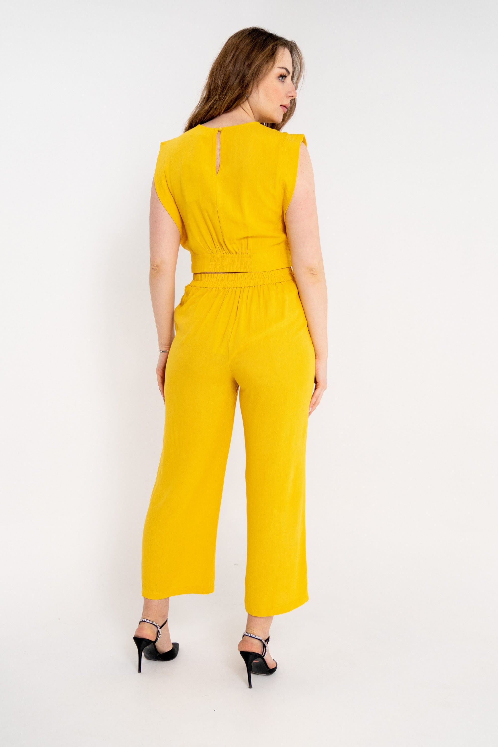 ميكا بنطلون سادة واسع بجيوب جانبية نسائي