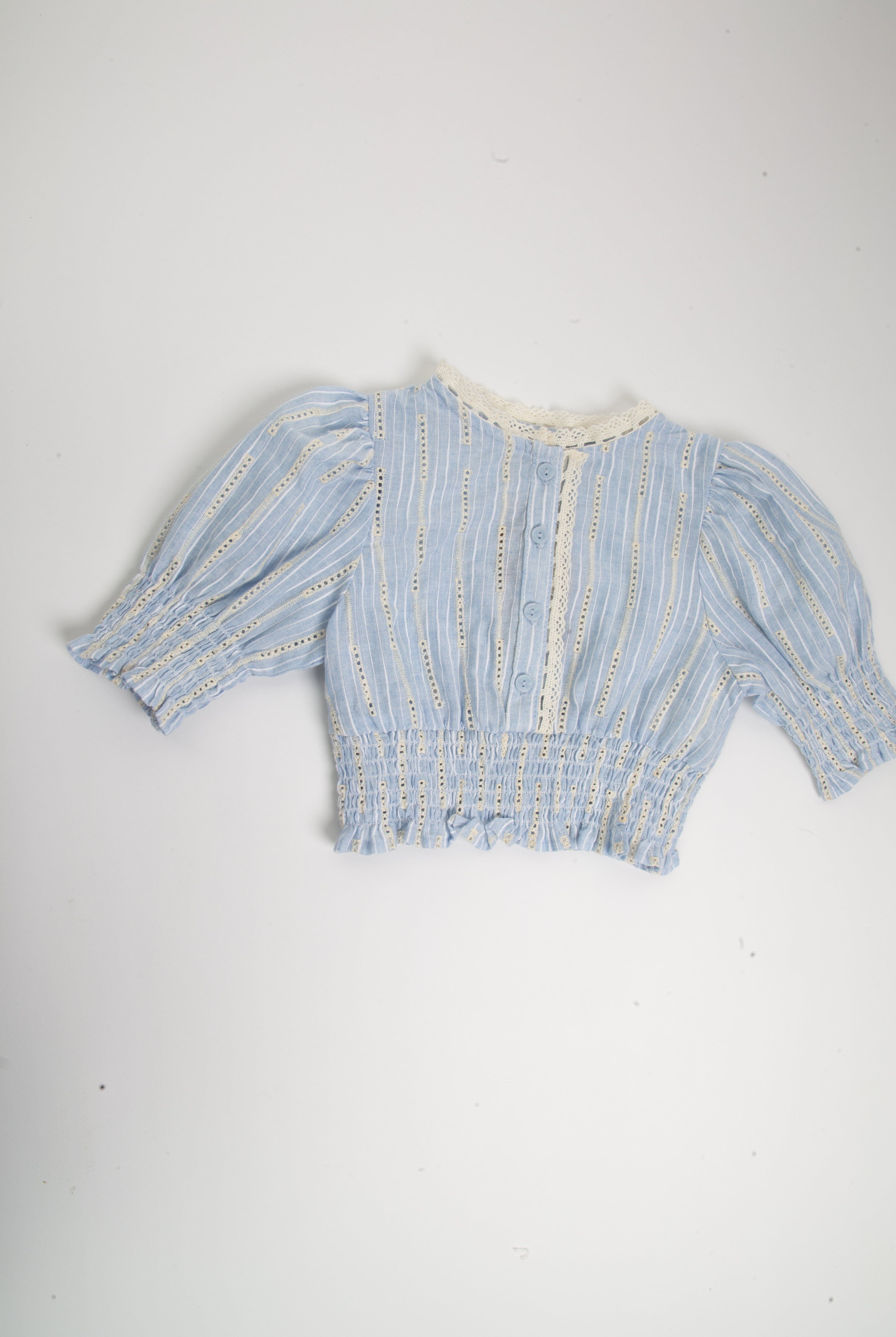 جينجرسنابس بلوزة نص بطن نص كم بف بناتي أزرق