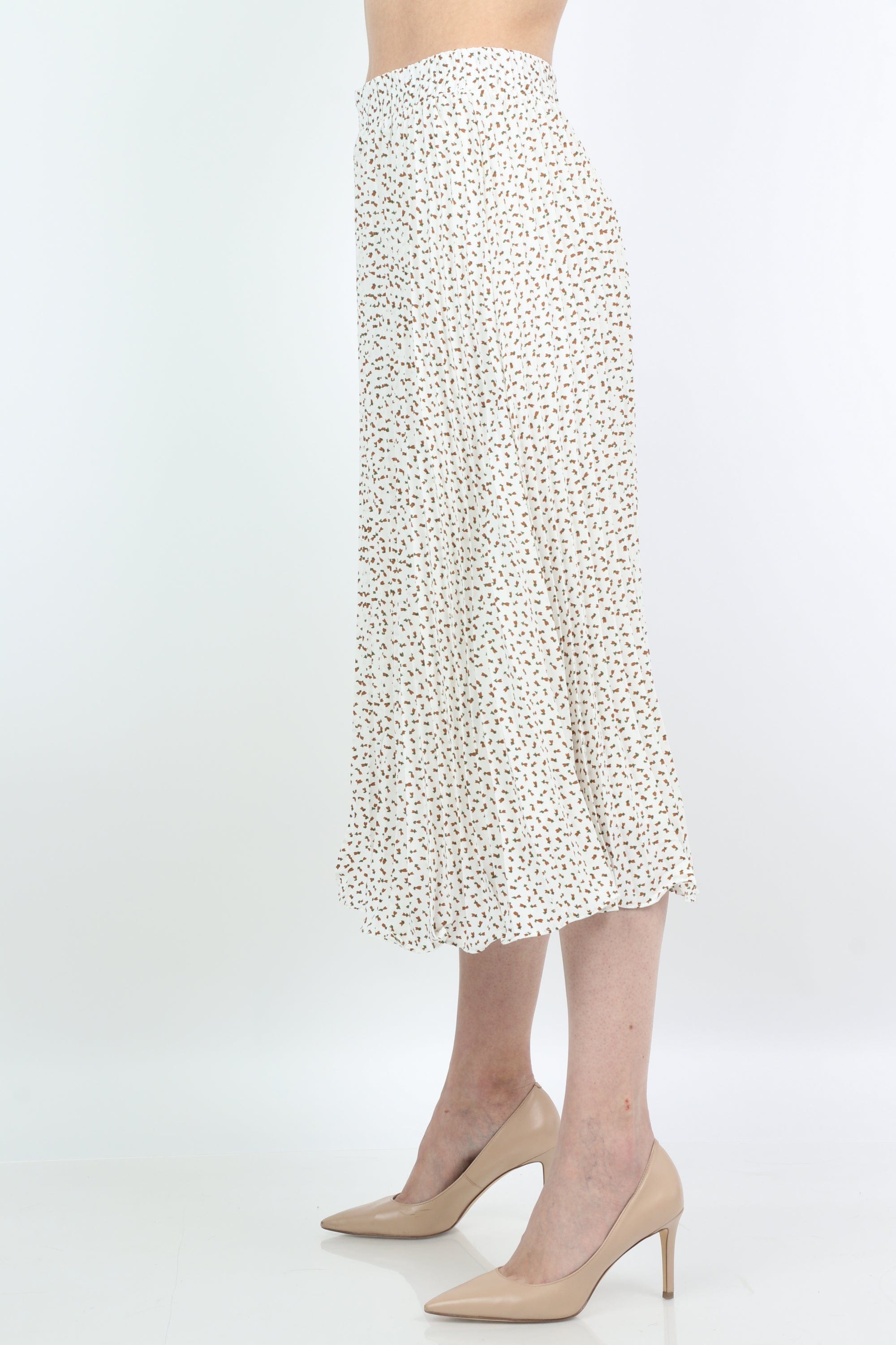 ميكا تنورة ميدي منقوشة بورود صغيرة بكسرات صغيرة