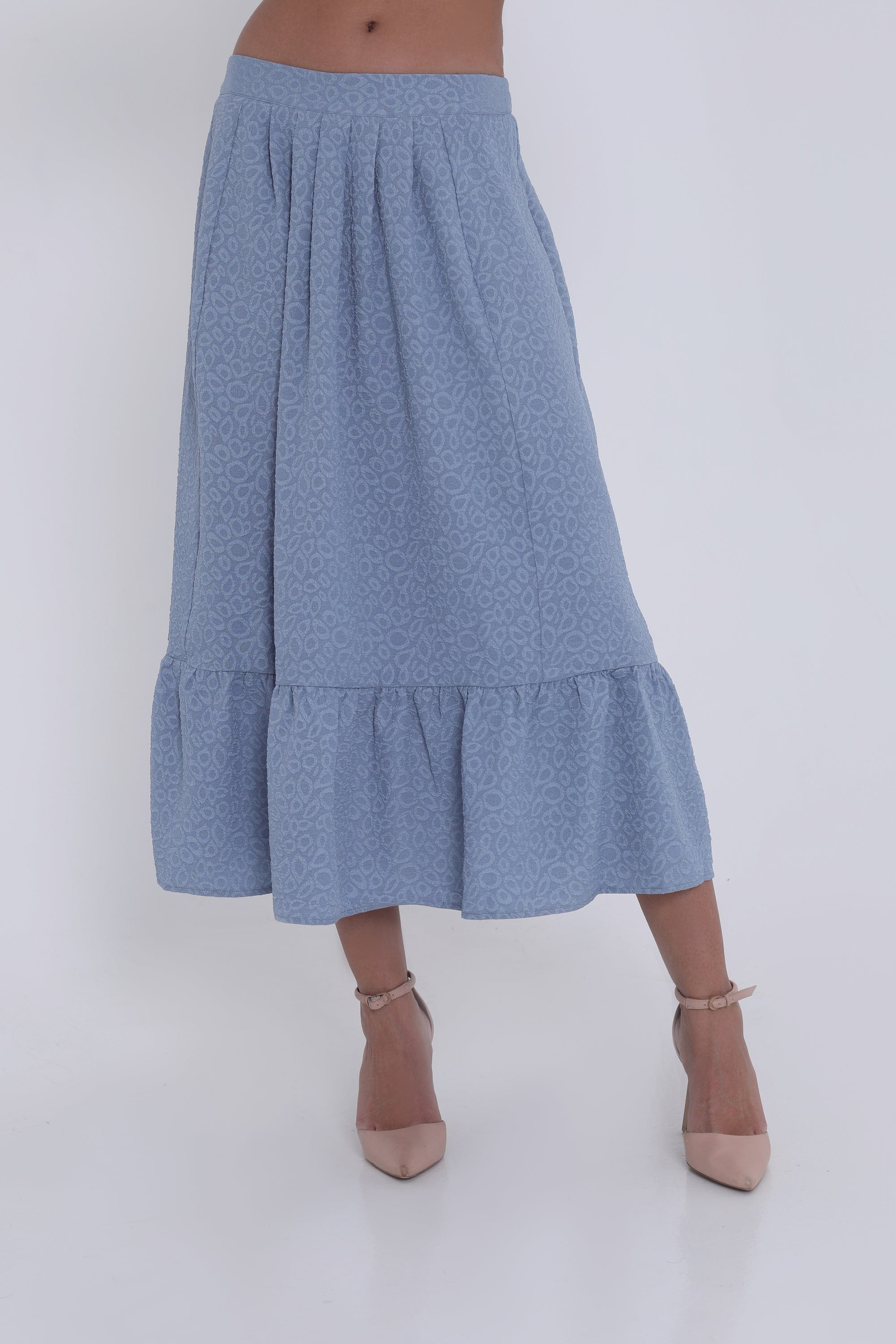 ميكا تنورة ميدي منقوشة بكسرات كشكش من الأسفل