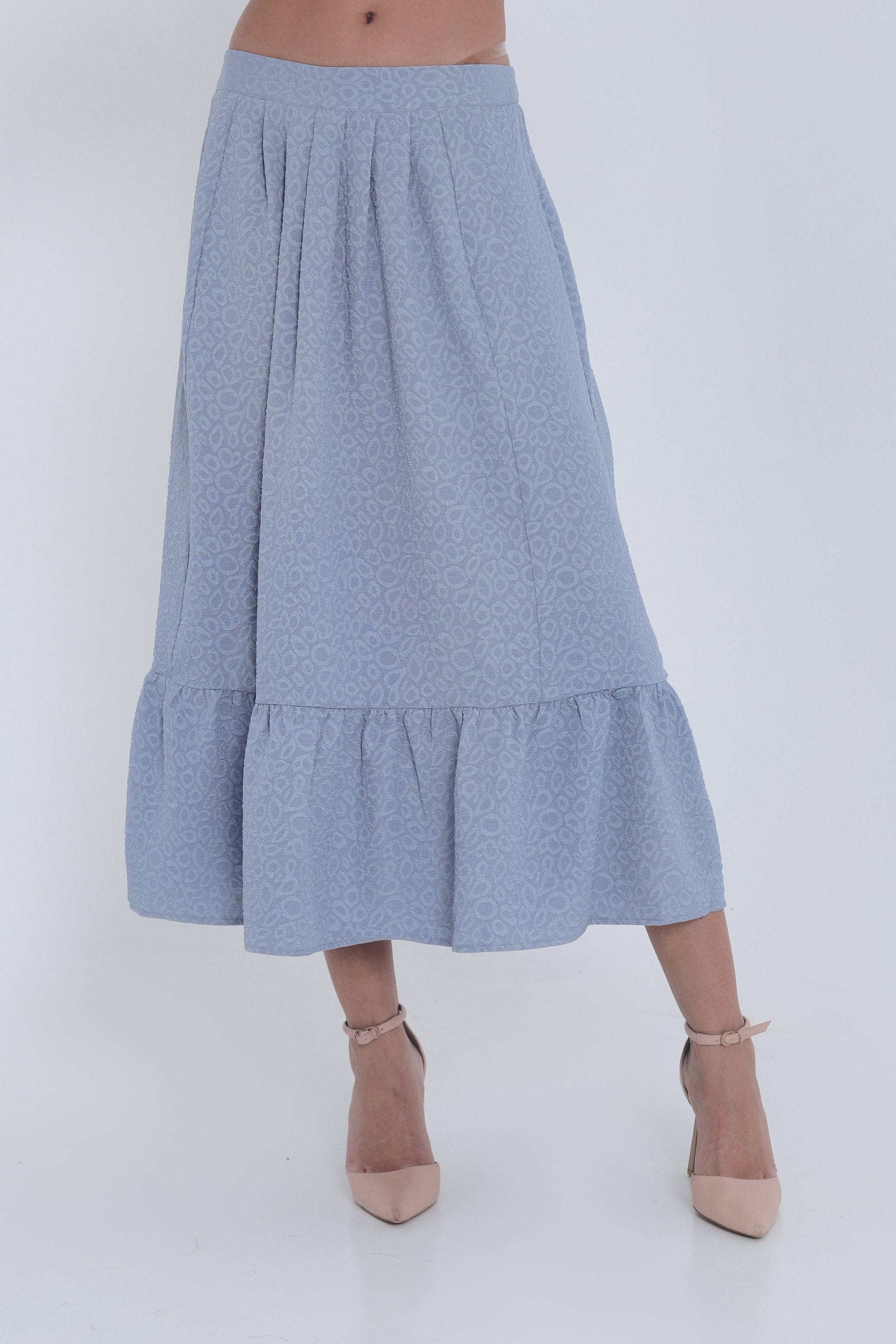 ميكا تنورة ميدي منقوشة بكسرات كشكش من الأسفل