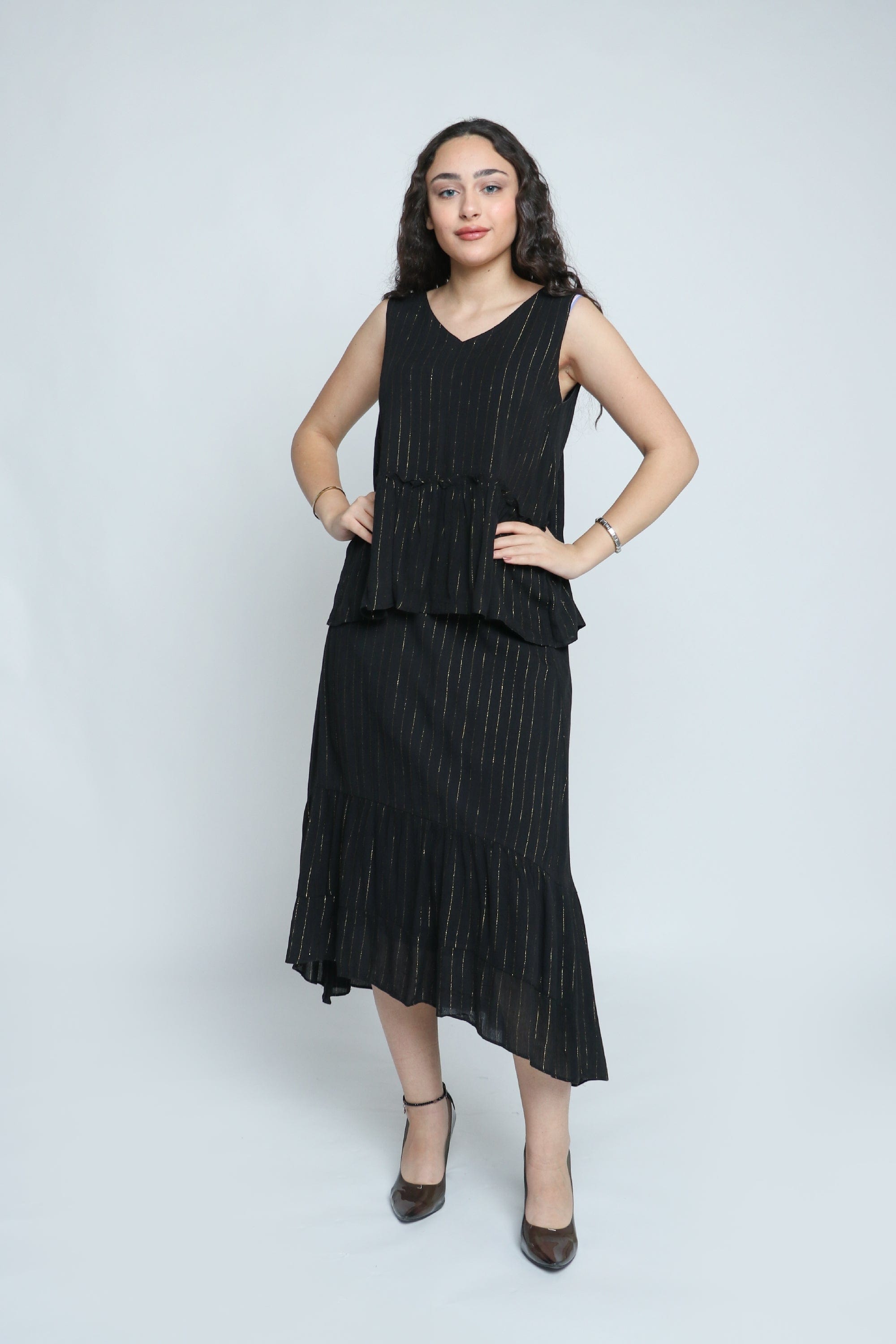 ميكا تنورة ميدي مقلمة بقصة سمكة