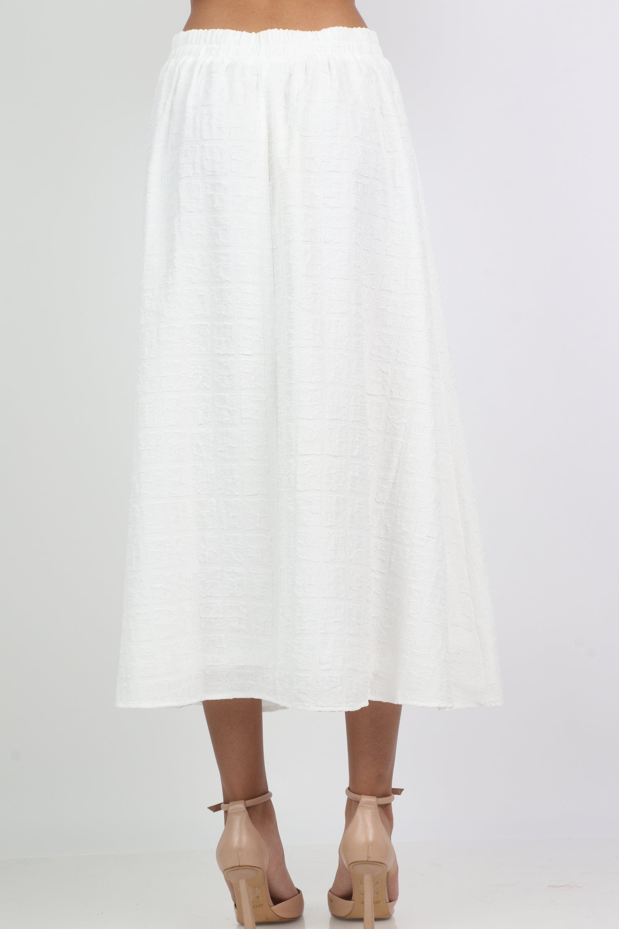 ميكا تنورة ميدي واسعة سادة بخصر مطاط عريض