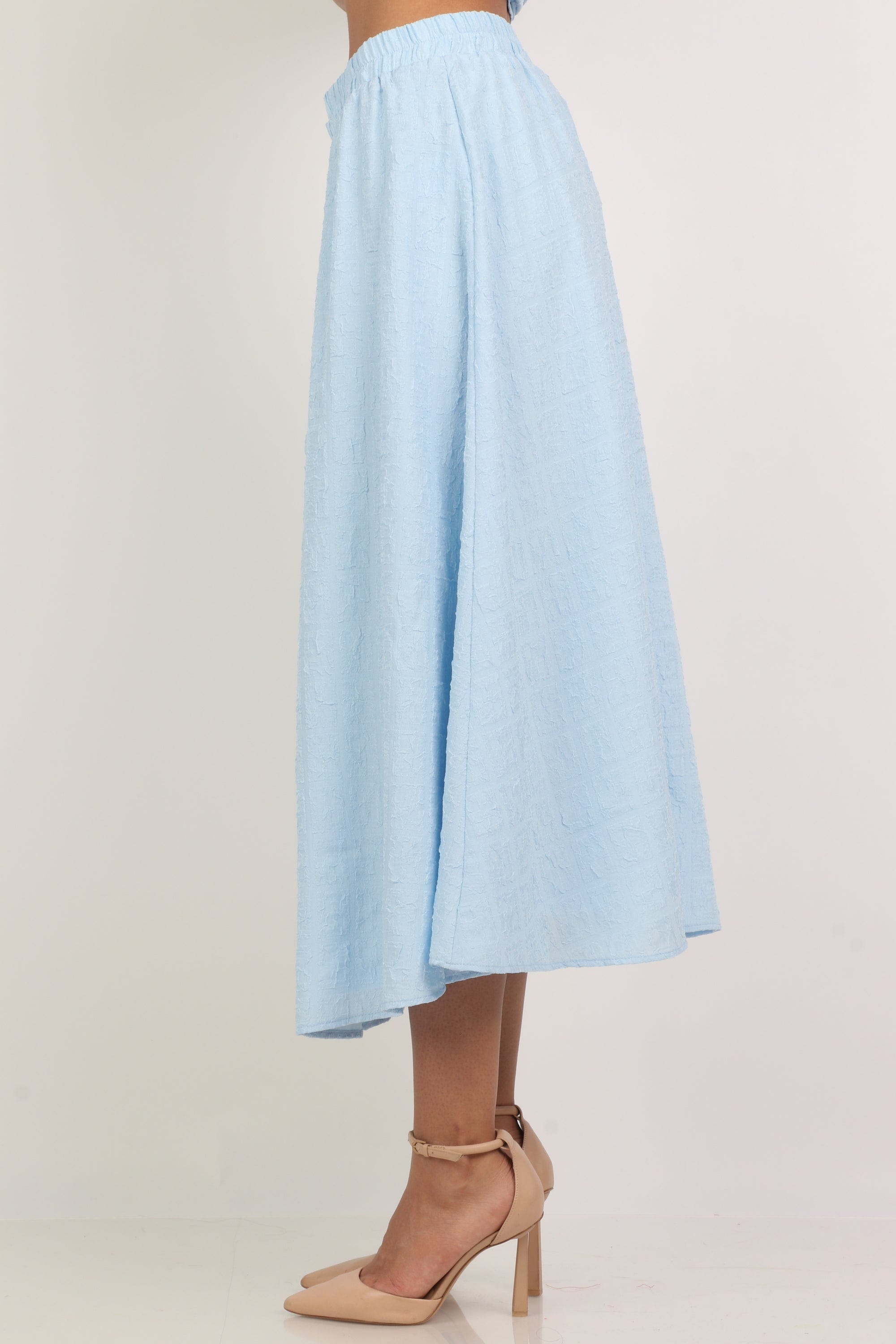 ميكا تنورة ميدي واسعة سادة بخصر مطاط عريض