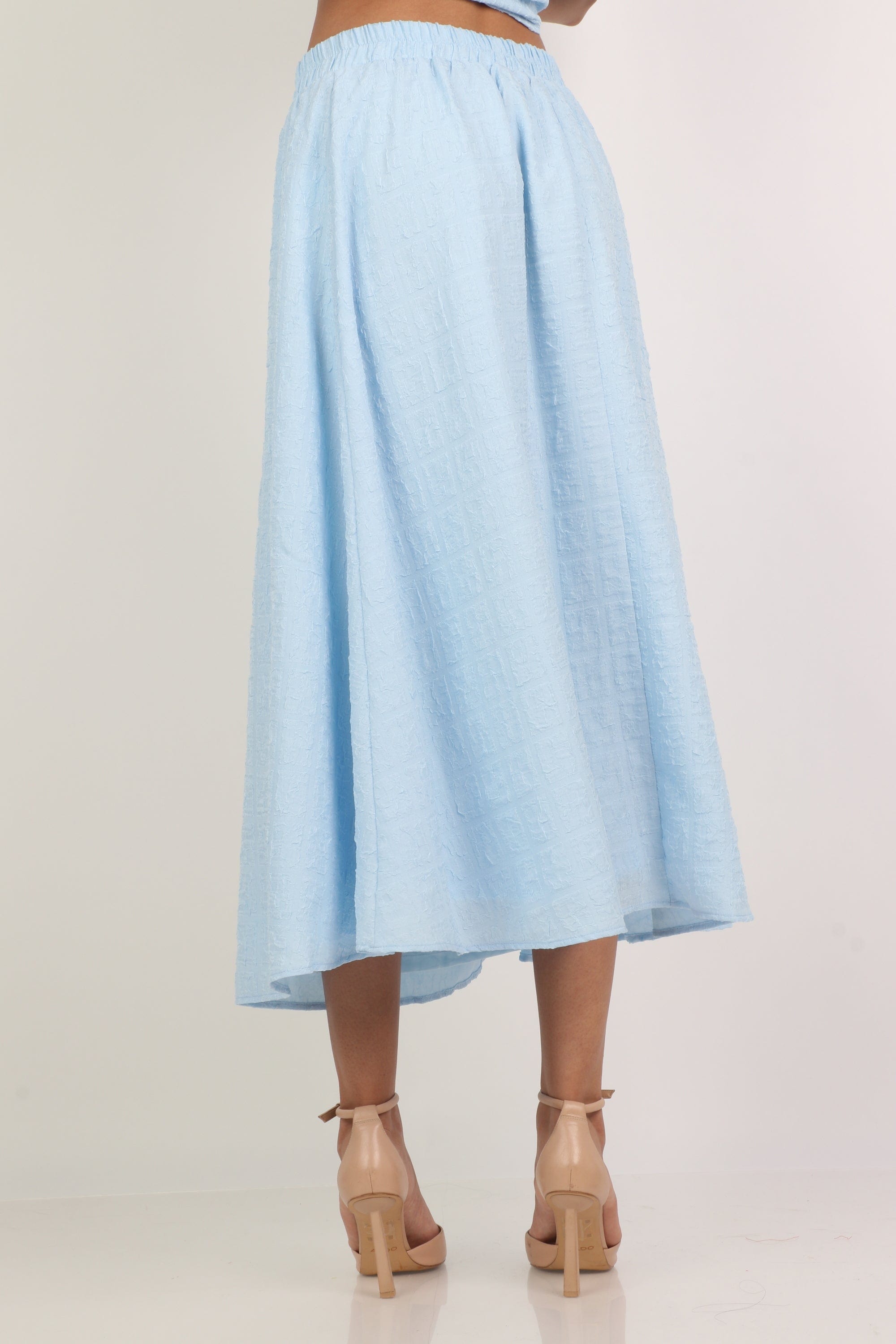 ميكا تنورة ميدي واسعة سادة بخصر مطاط عريض