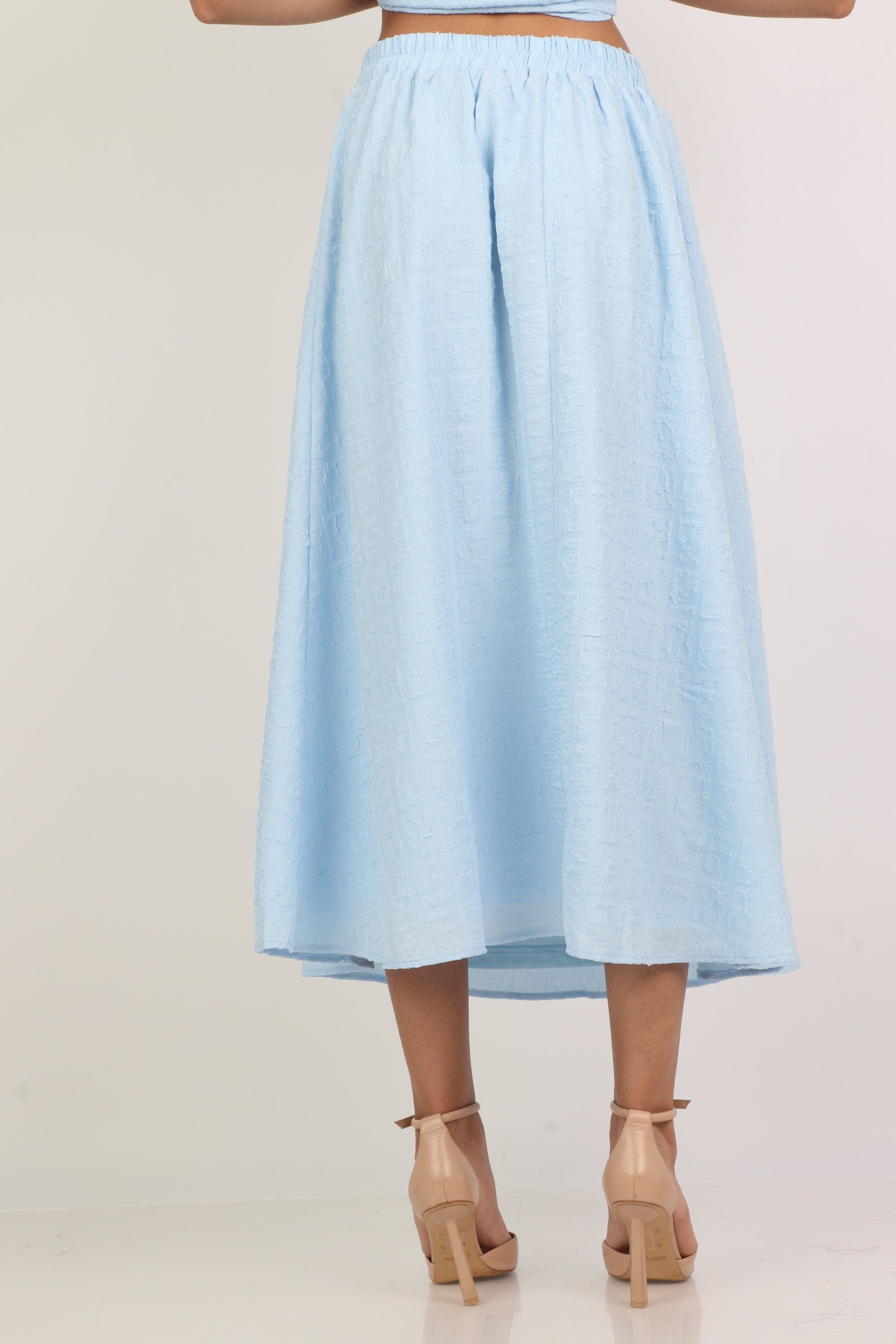 ميكا تنورة ميدي واسعة سادة بخصر مطاط عريض