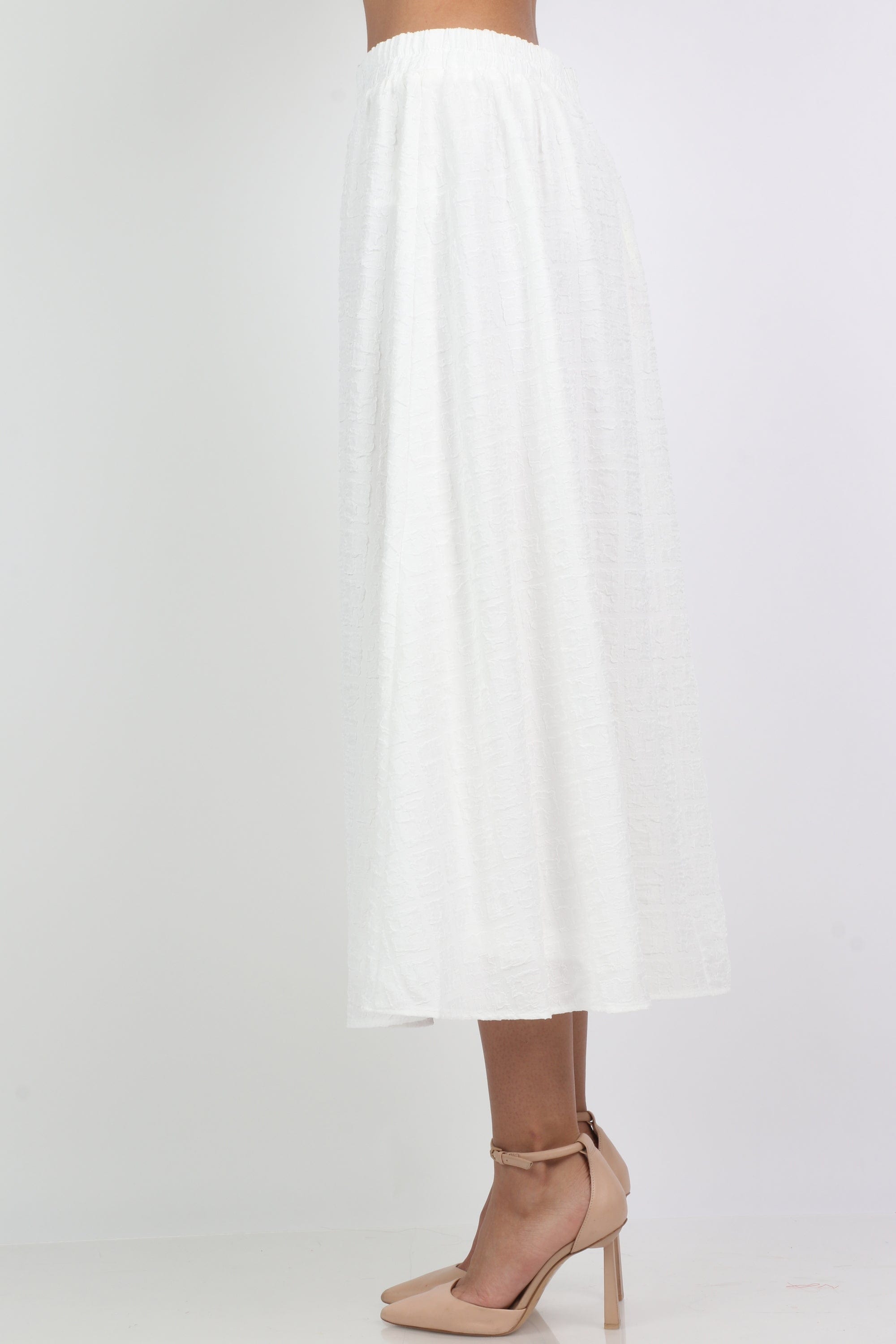 ميكا تنورة ميدي واسعة سادة بخصر مطاط عريض