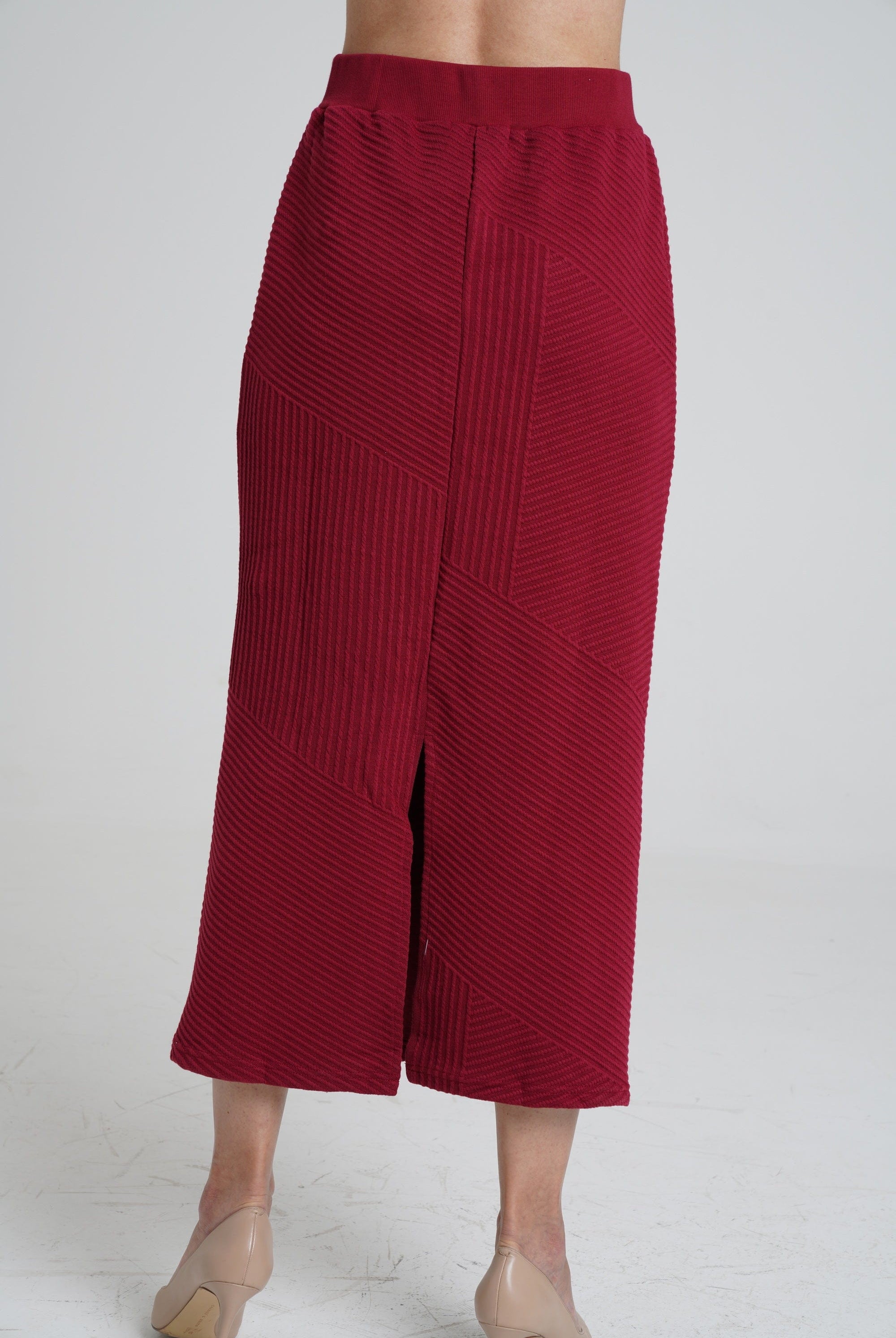 ميكا تنورة ميدي مضلعة سادة نسائي