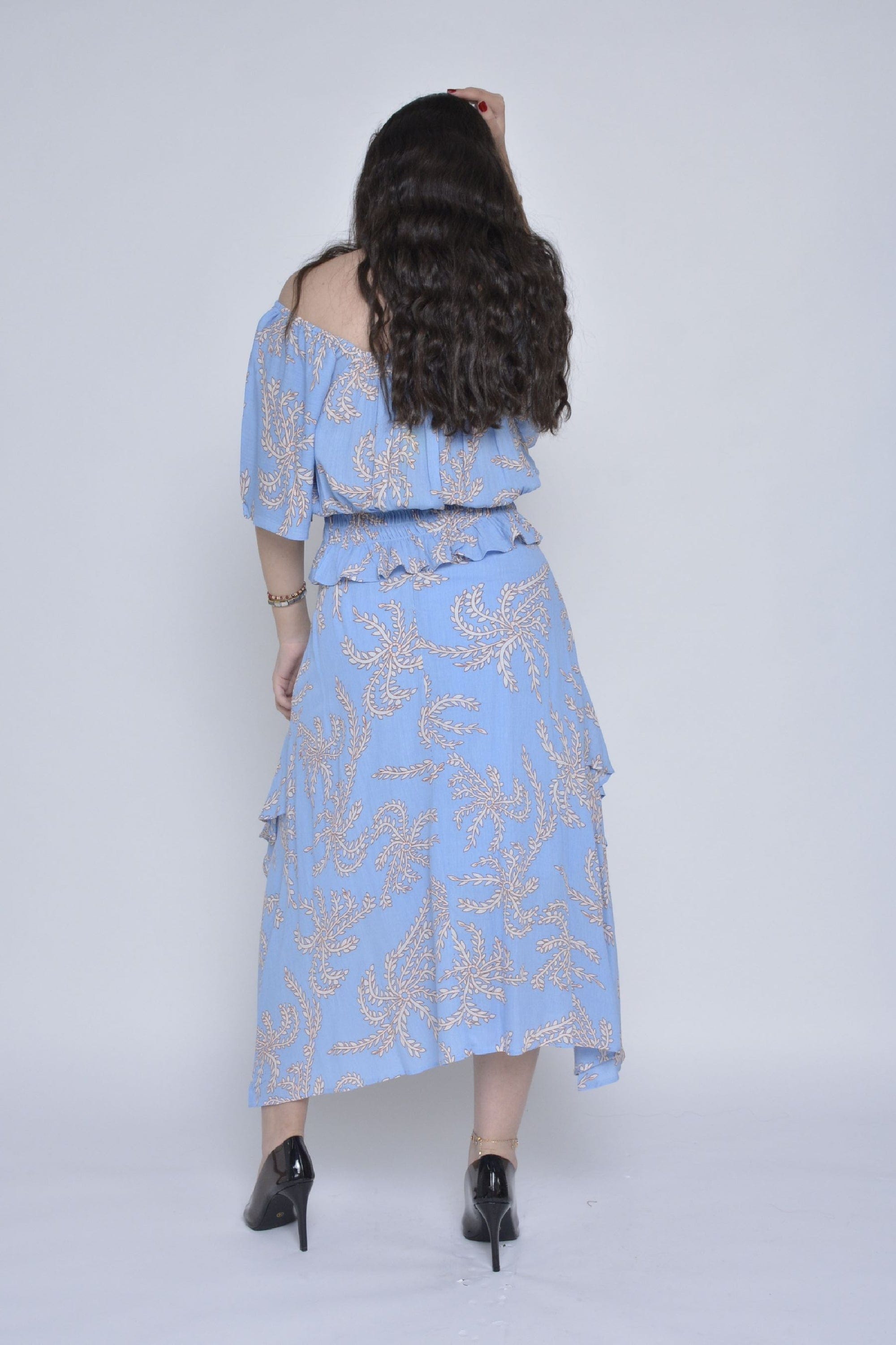 ميكا تنورة ميدي منقوشة مفتوحة من الجنب