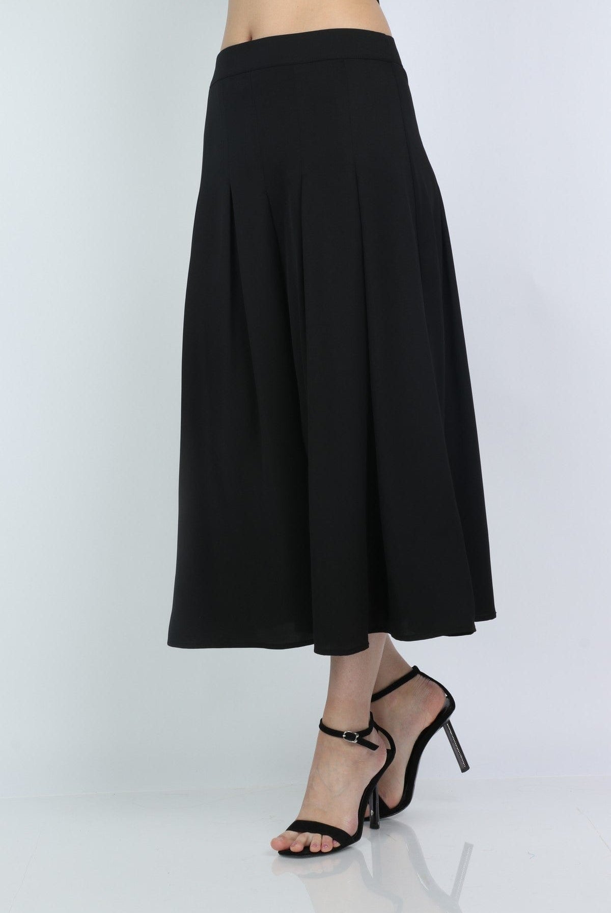 ميكا تنورة ميدي رسمية سادة بكسرات