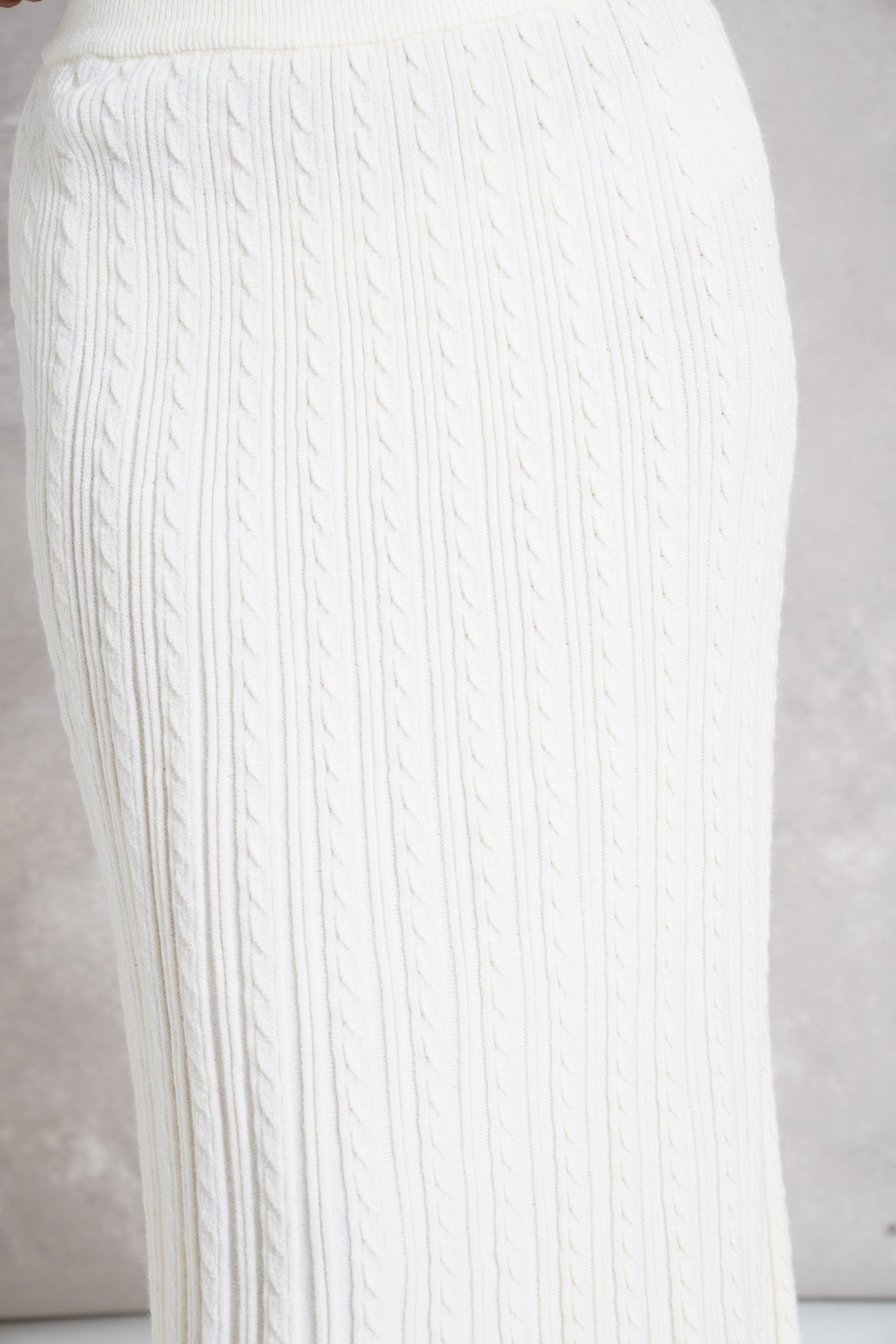 ميكا تنورة ميدي سادة مضلعة بخصر مطاط