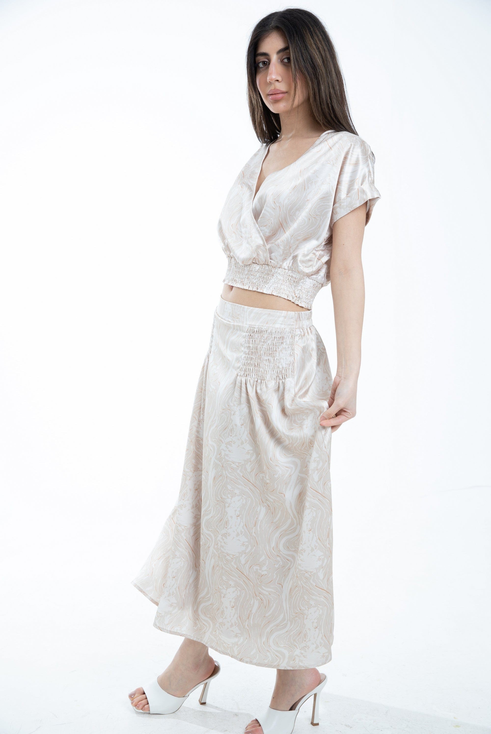 ميكا تنورة ميدي منقوشة بجزء مطاطي على الخصر