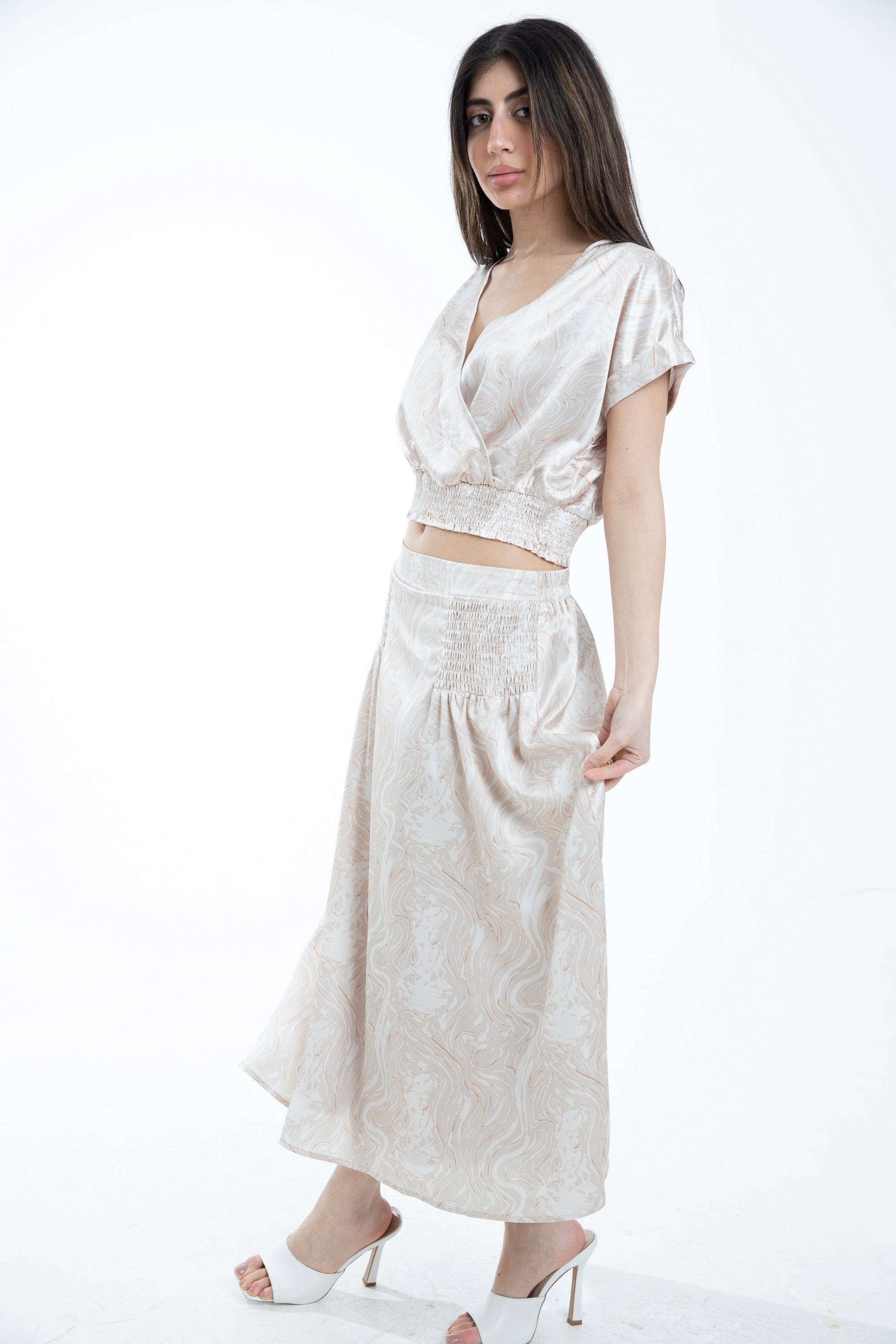 ميكا تنورة ميدي منقوشة بجزء مطاطي على الخصر