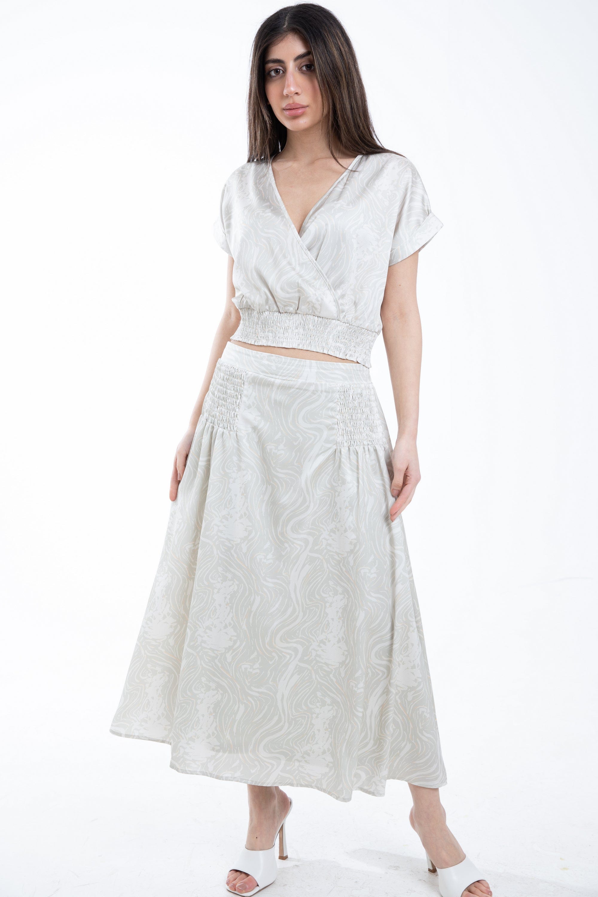 ميكا تنورة ميدي منقوشة بجزء مطاطي على الخصر