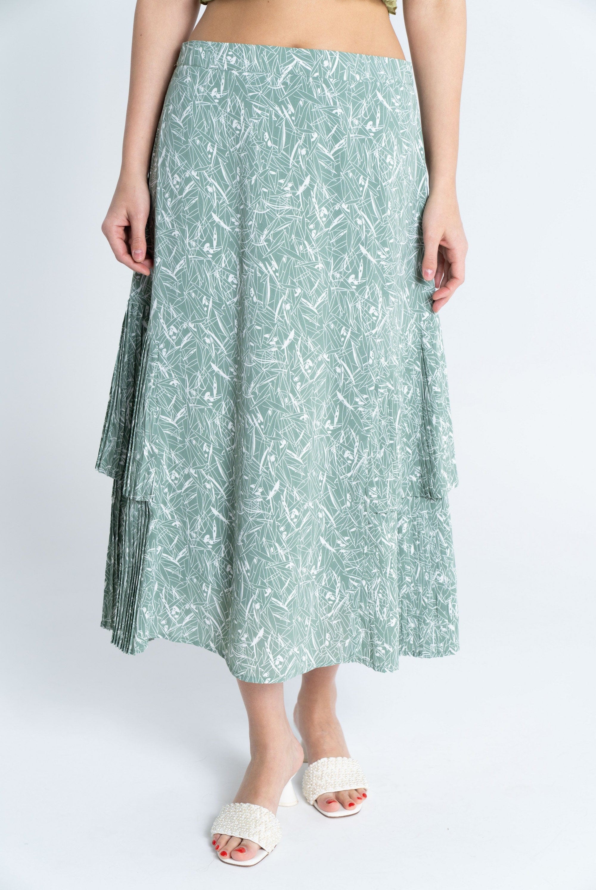 ميكا تنورة ميدي مشجرة بليسية من الأسفل