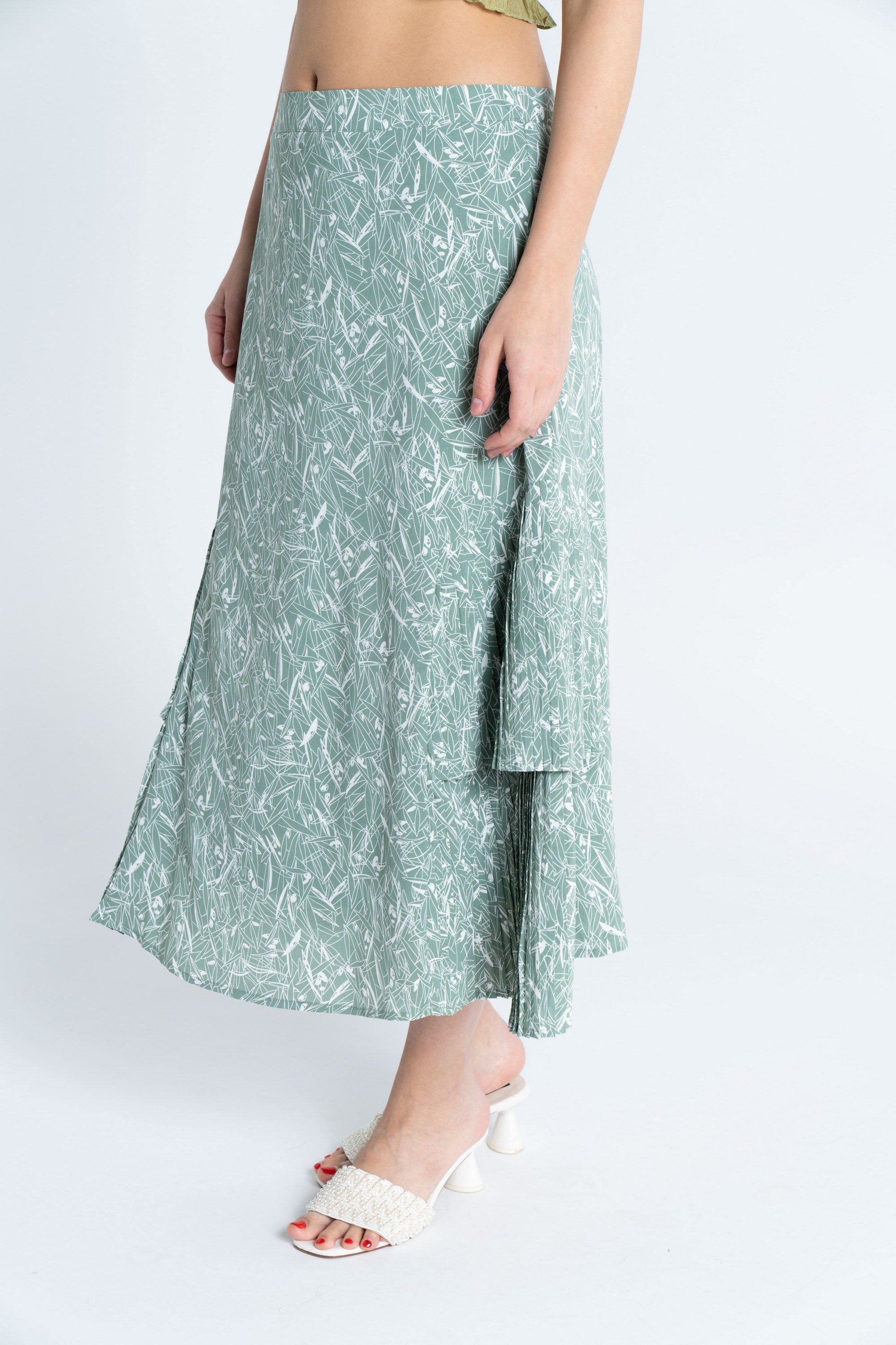 ميكا تنورة ميدي مشجرة بليسية من الأسفل