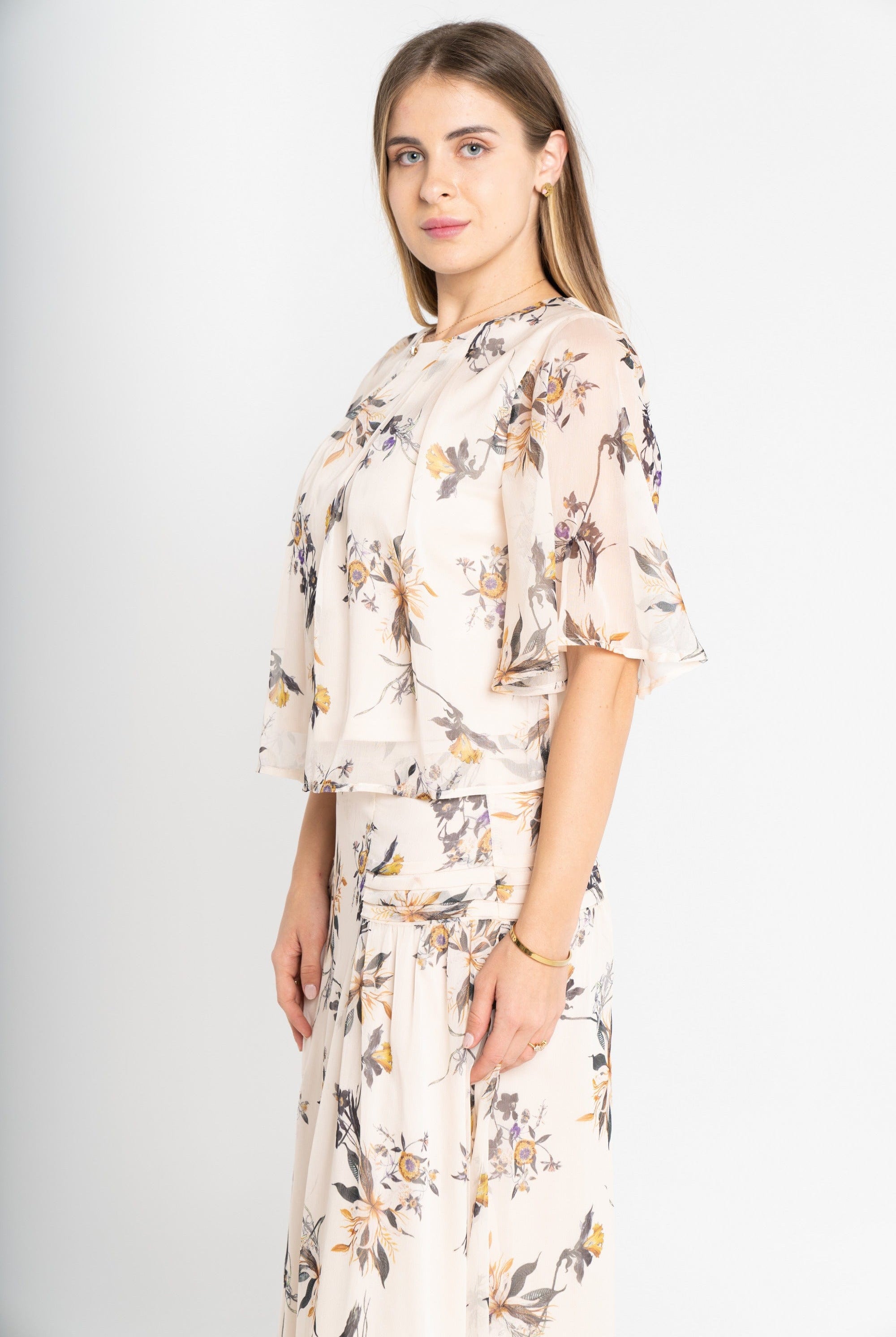 ميكا بلوزة منقوشة كم فراشة