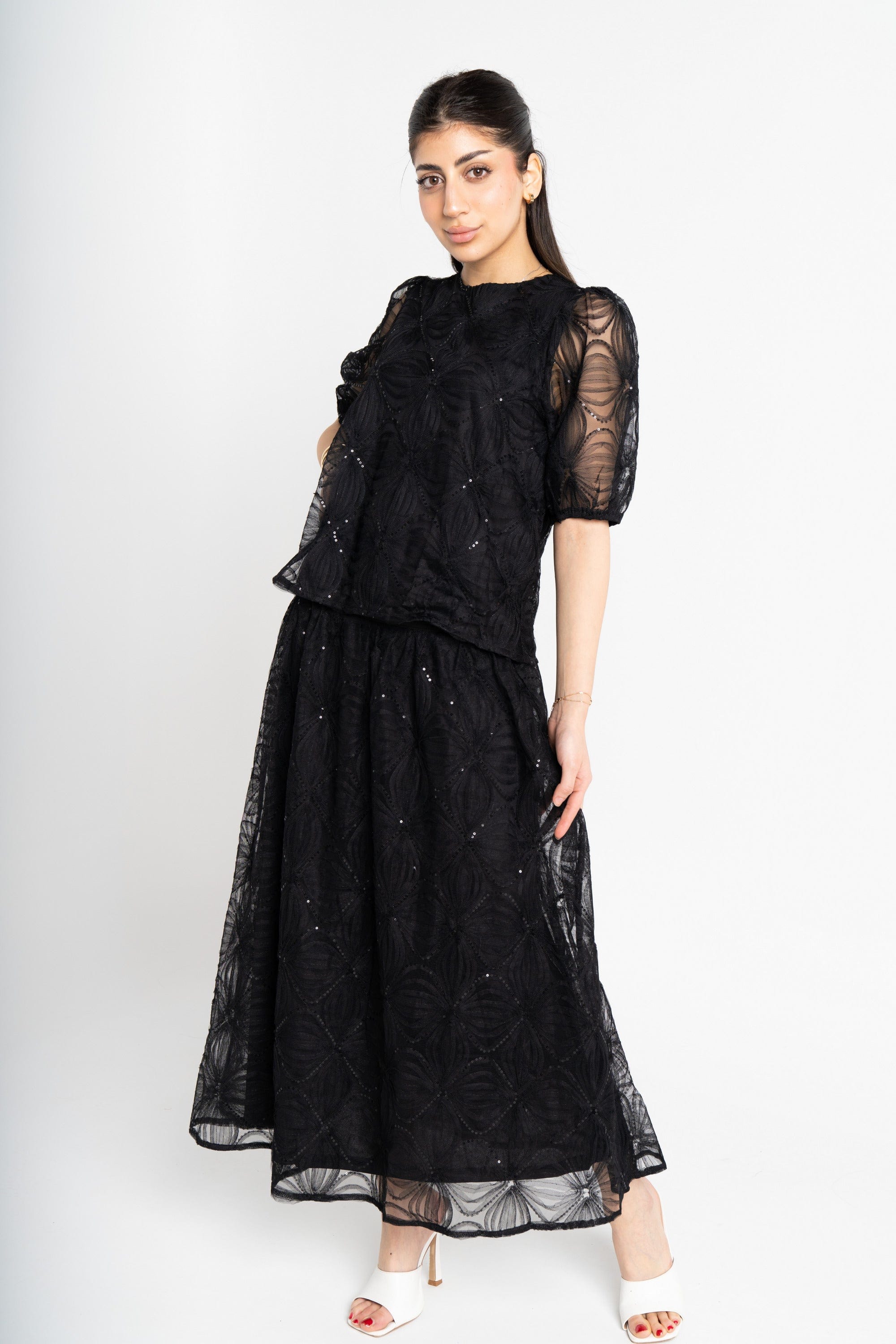 ميكا تنورة ميدي لامعة شفافة مبطنة