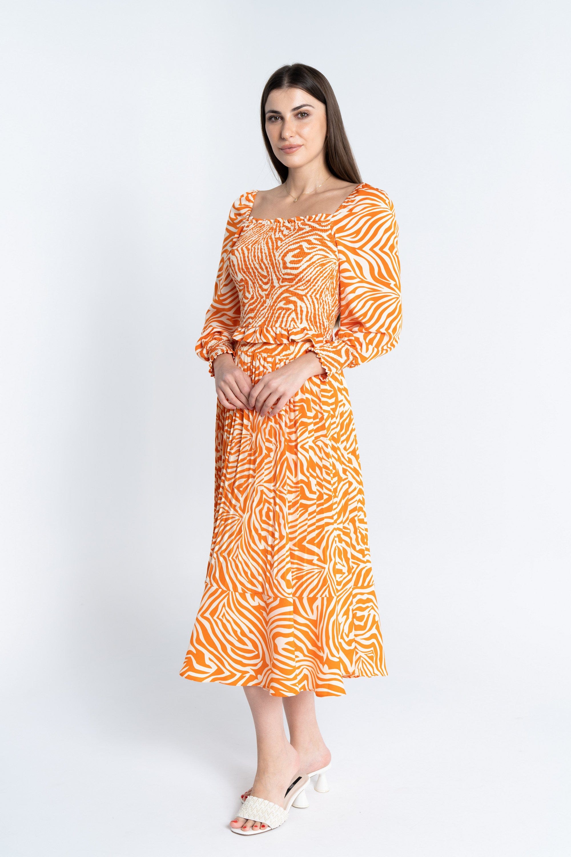 ميكا توب منقوش بياقة مربعة كم طويل بف نسائي