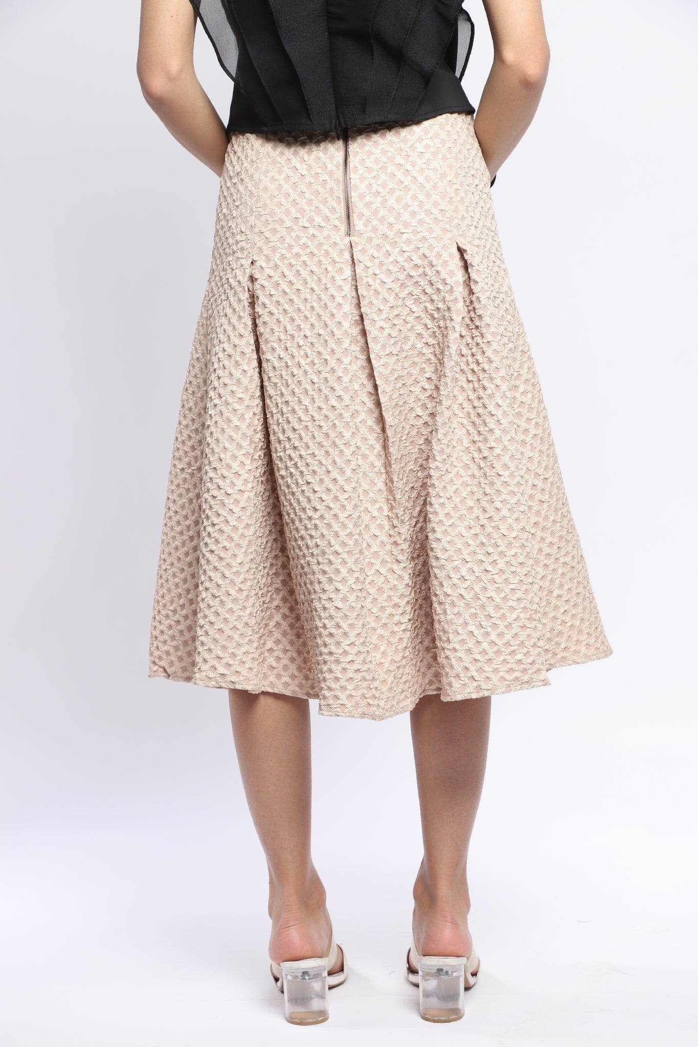 نتشي تنورة ميدي سادة بخصر عالي بكسرات