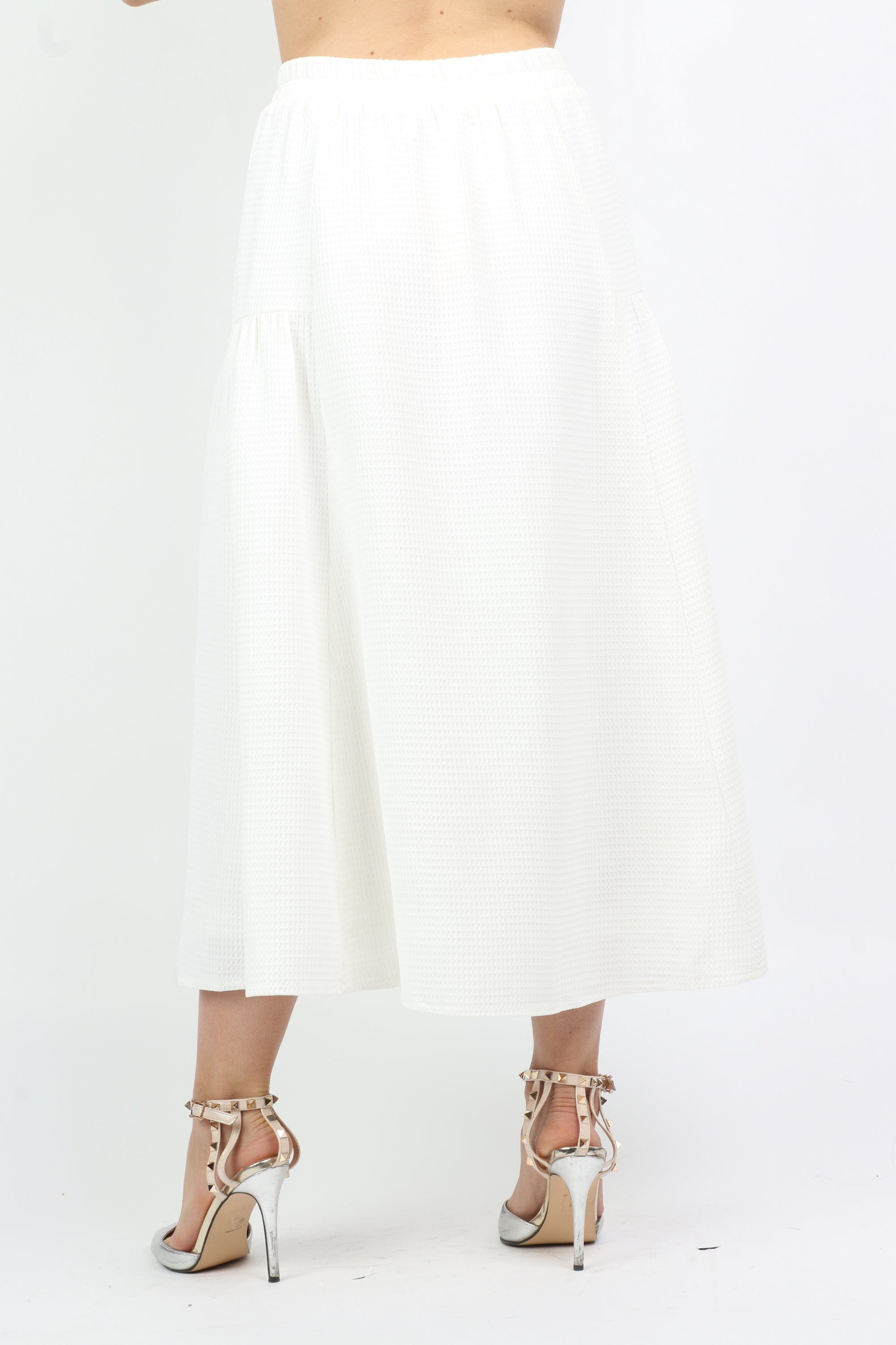 نتشي تنورة ميدي سادة قماش مخرم بخصر مطاط