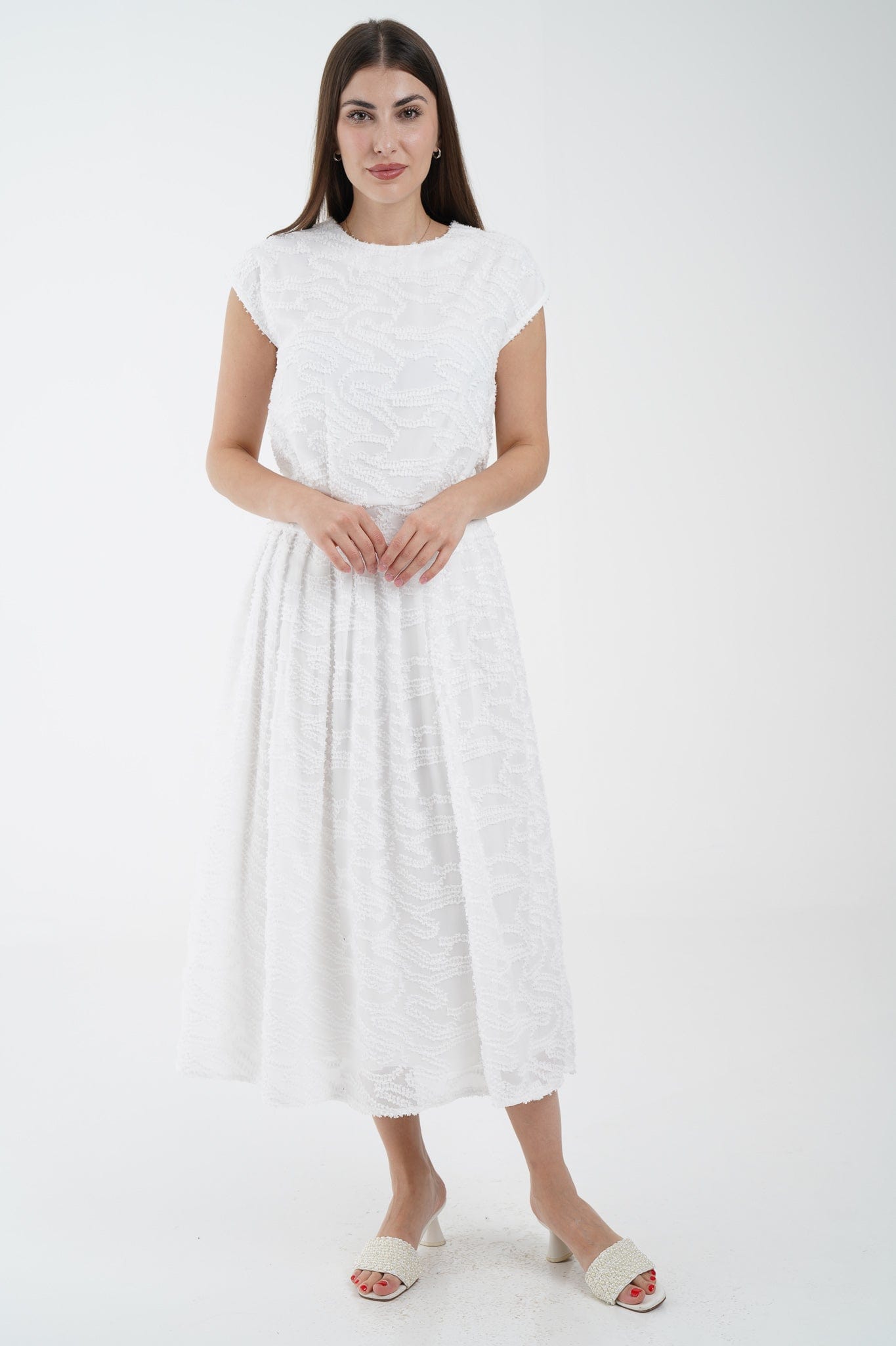 نتشي بلوزة بدون أكمام منقوش بياقة دائرية