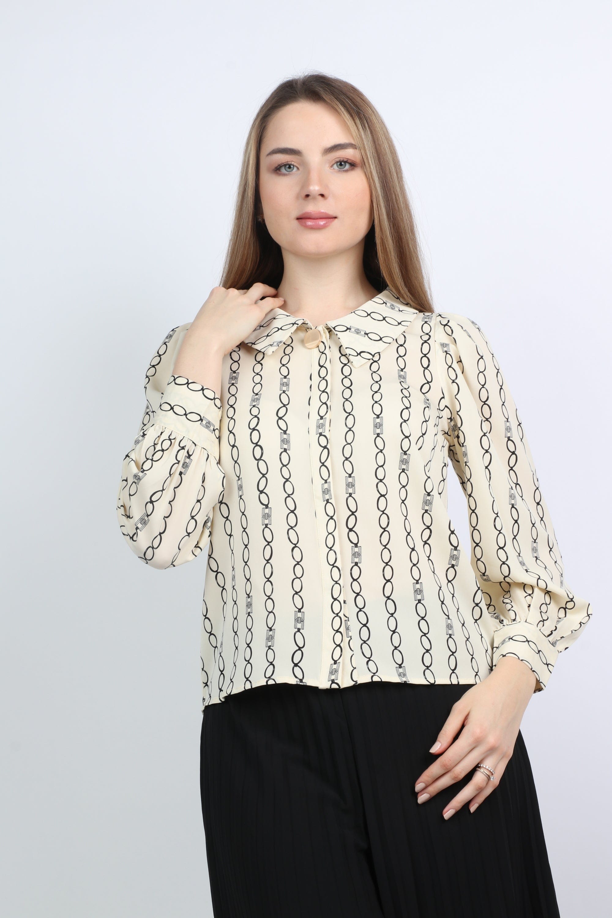 نتشي بلوزة منقوشة كم طويل