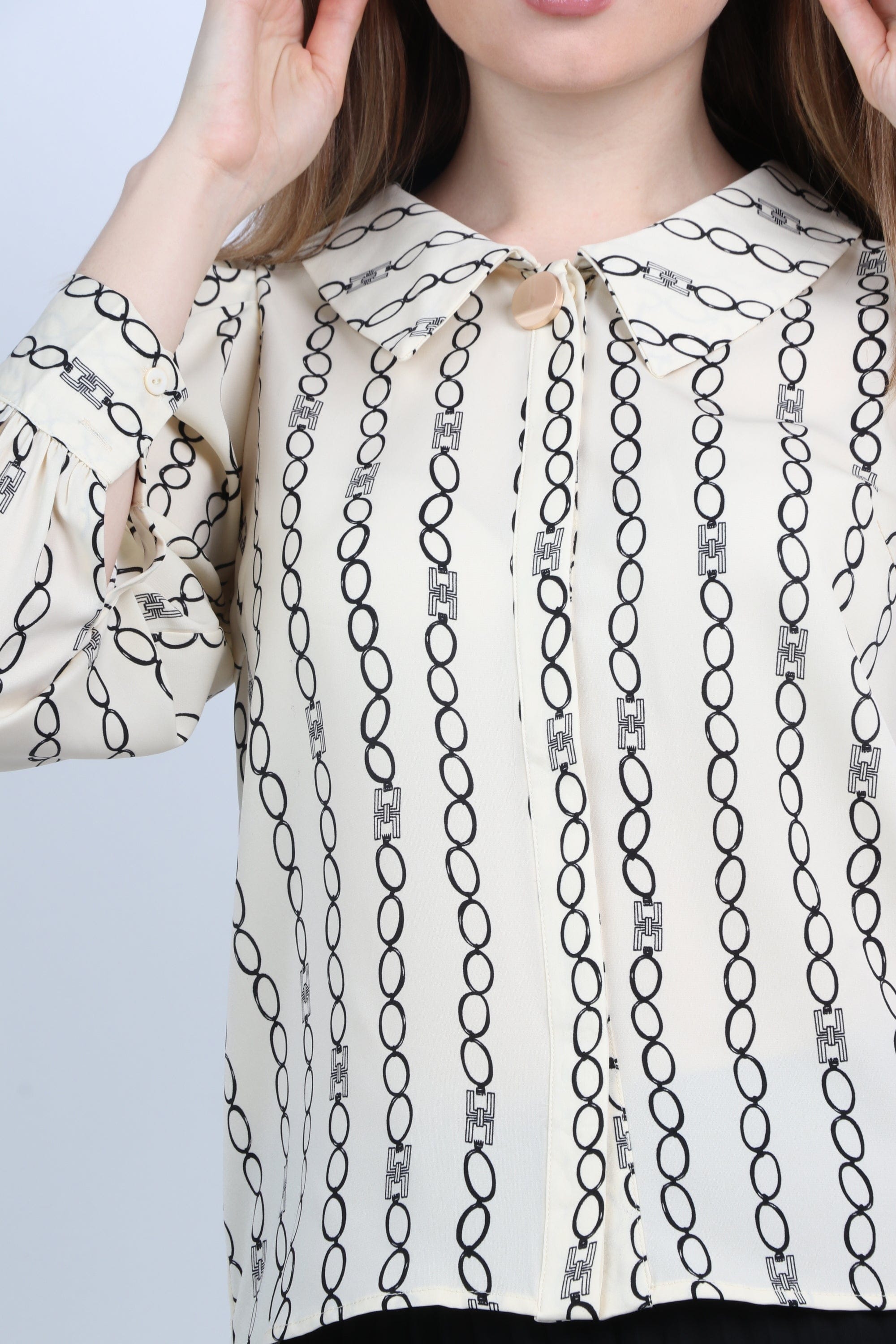 نتشي بلوزة منقوشة كم طويل