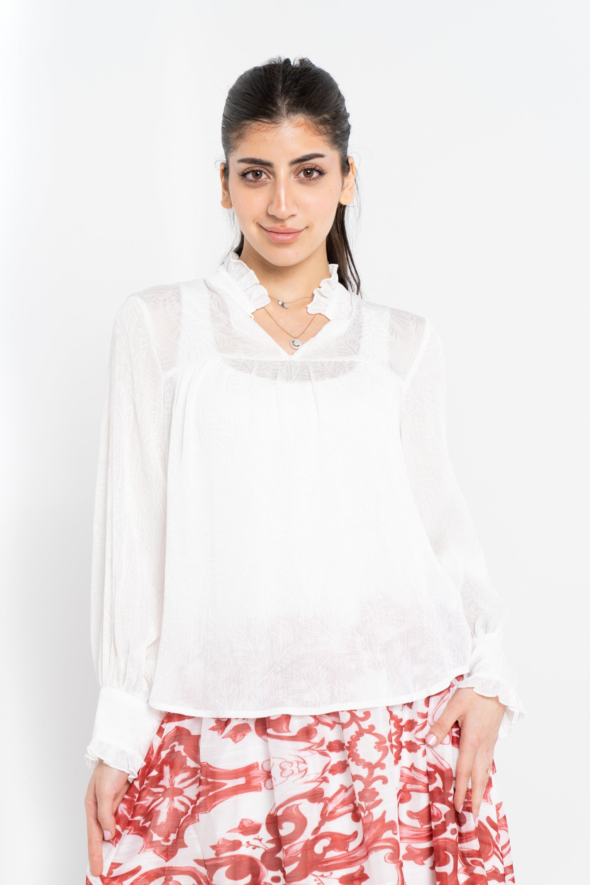 نتشي بلوزة سادة كم طويل بف نسائي