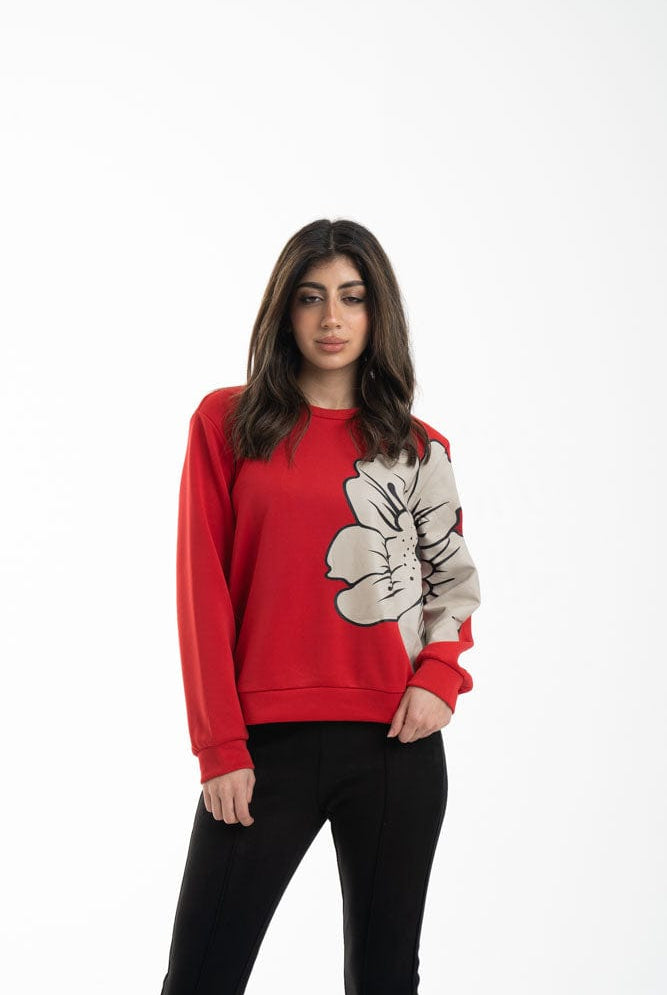 نتشي بلوزة نسائية بياقة دائرية بنقشة وردة علي الصدر