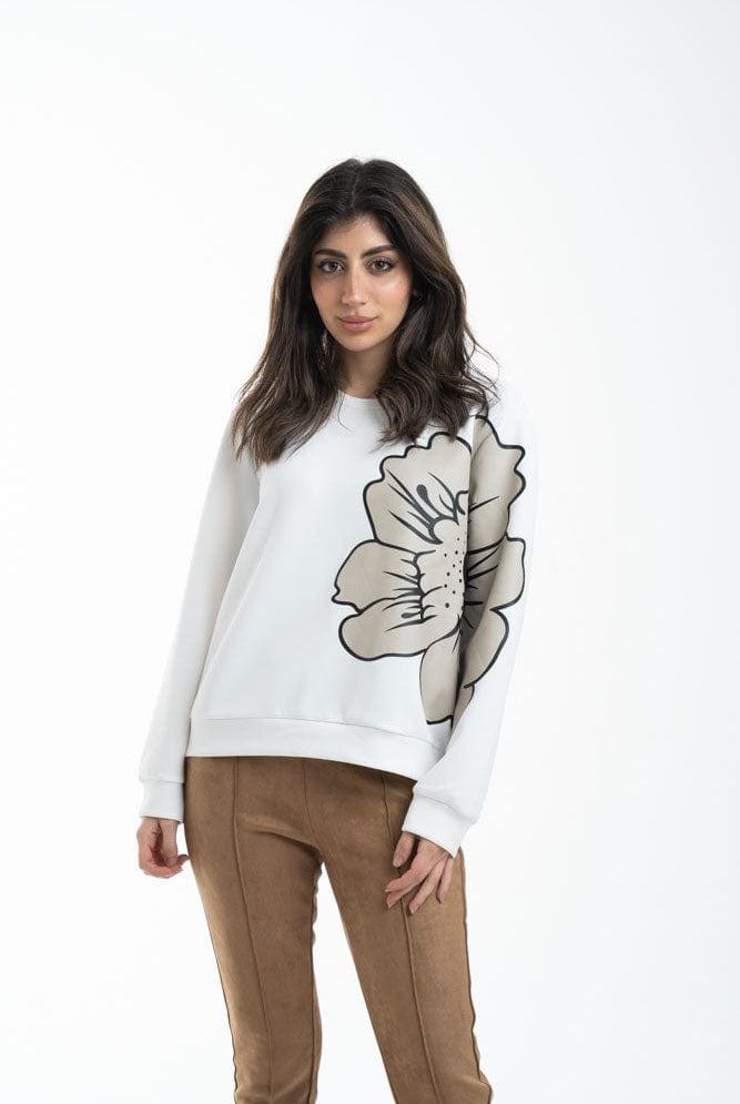 نتشي بلوزة نسائية بياقة دائرية بنقشة وردة علي الصدر