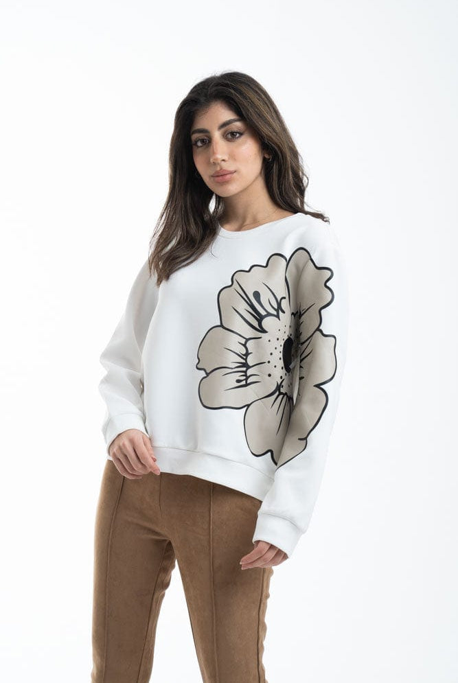 نتشي بلوزة نسائية بياقة دائرية بنقشة وردة علي الصدر