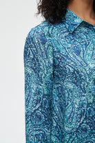 نتشي بلوزة نسائية منقوشة بكم طويل وأزرار أمامية