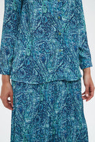 نتشي بلوزة نسائية منقوشة بكم طويل وأزرار أمامية