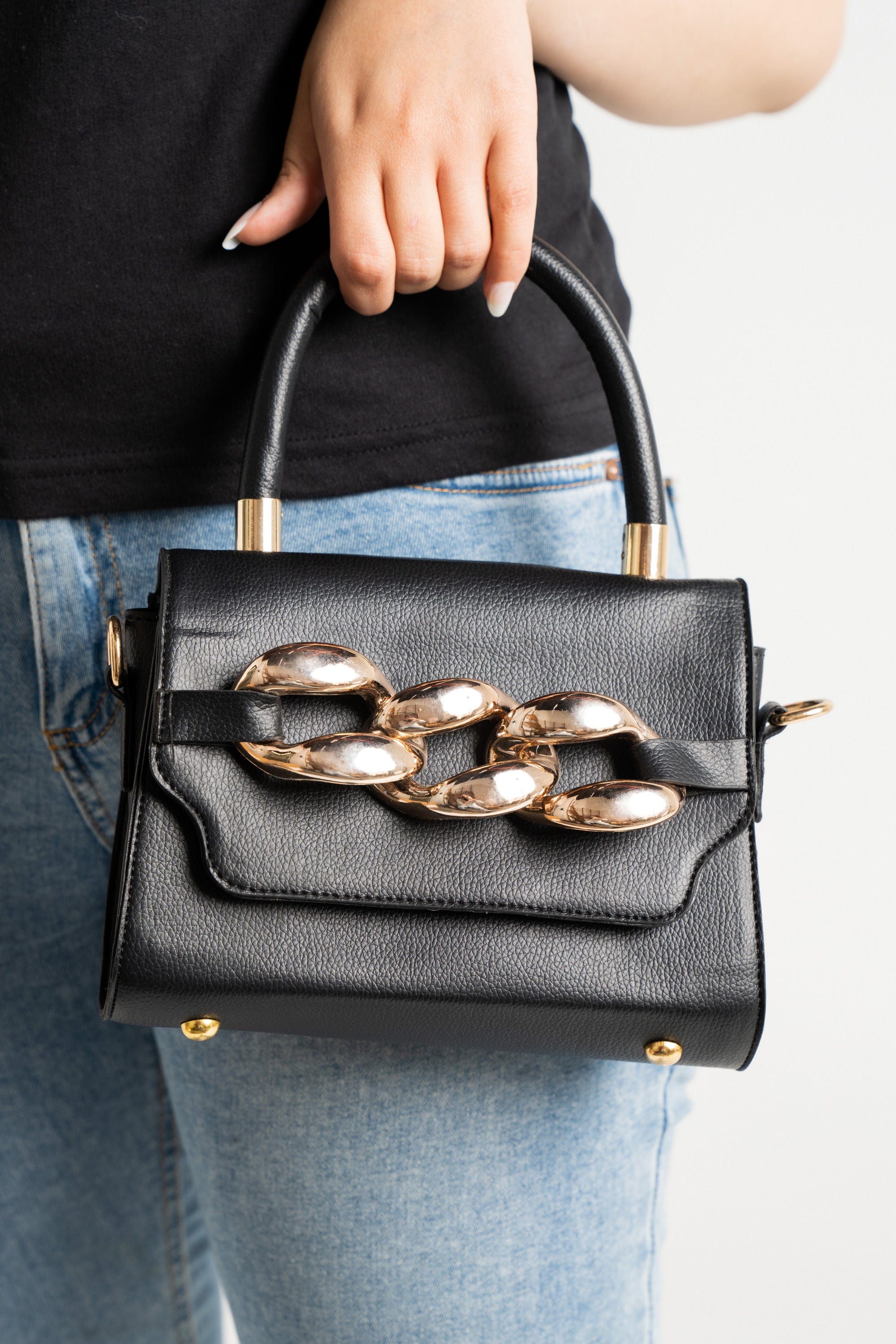 داليدرس حقيبة يد جلد بحلقات معدنية أسود