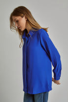 داليدرس بلوزة نسائية سادة بأكمام طويلة