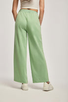 داليدرس بنطال نسائي سادة بخط جانبي أخضر