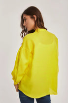 داليدرس بلوزة سادة بأزرار أمامية كم طويل