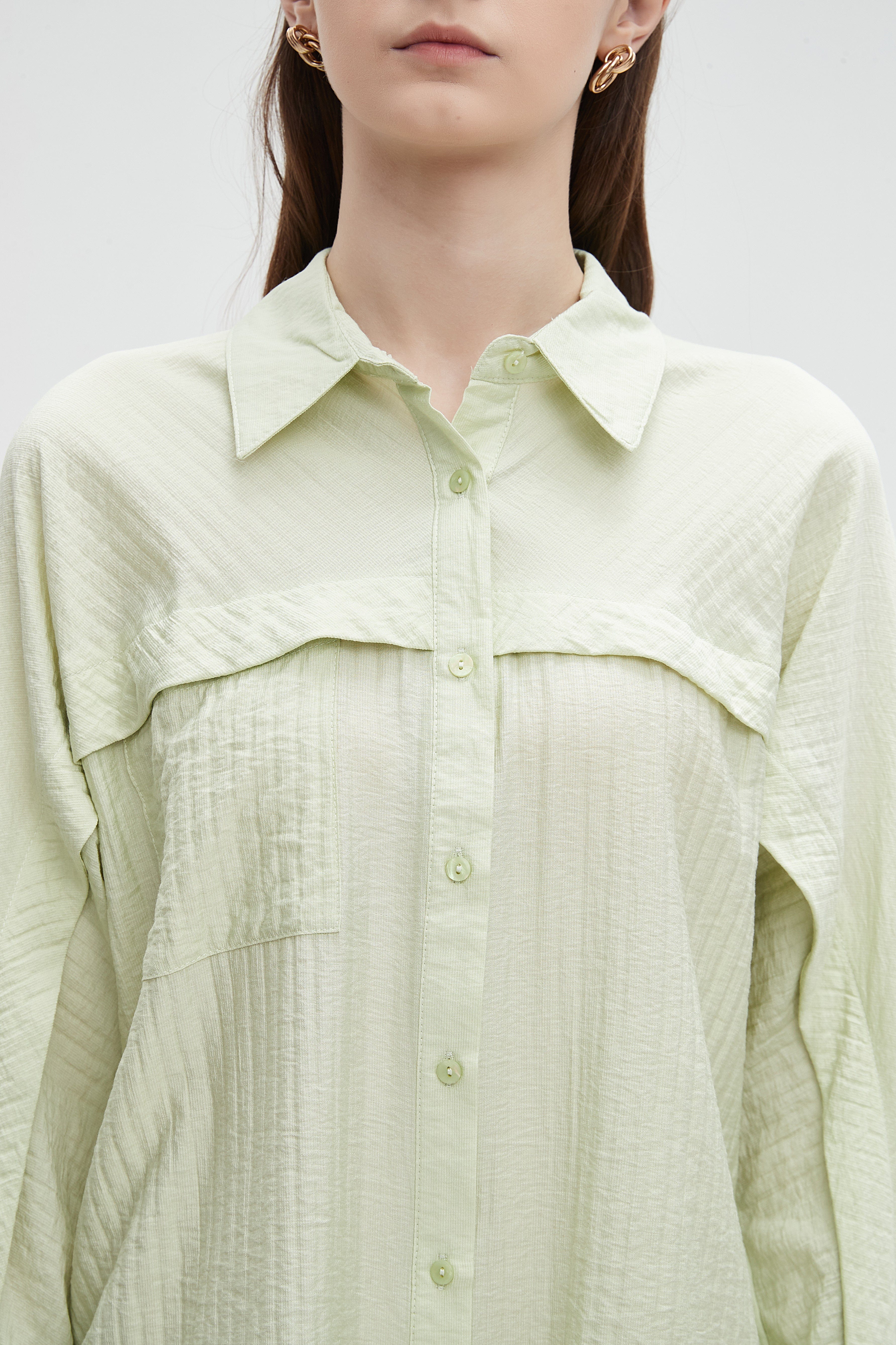 ميكا بلوزة نسائية سادة بقصة على الصدر واكمام طويلة