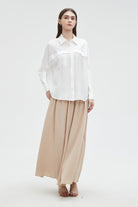 ميكا بلوزة نسائية سادة بقصة على الصدر واكمام طويلة