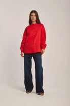 داليدرس بلوزة سادة بأزرار أمامية كم طويل