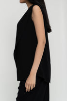 داليدرس بلوزة نسائة سادة بدون أكمام