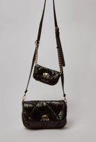 داليدرس حقيبة كتف سادة مضلعة