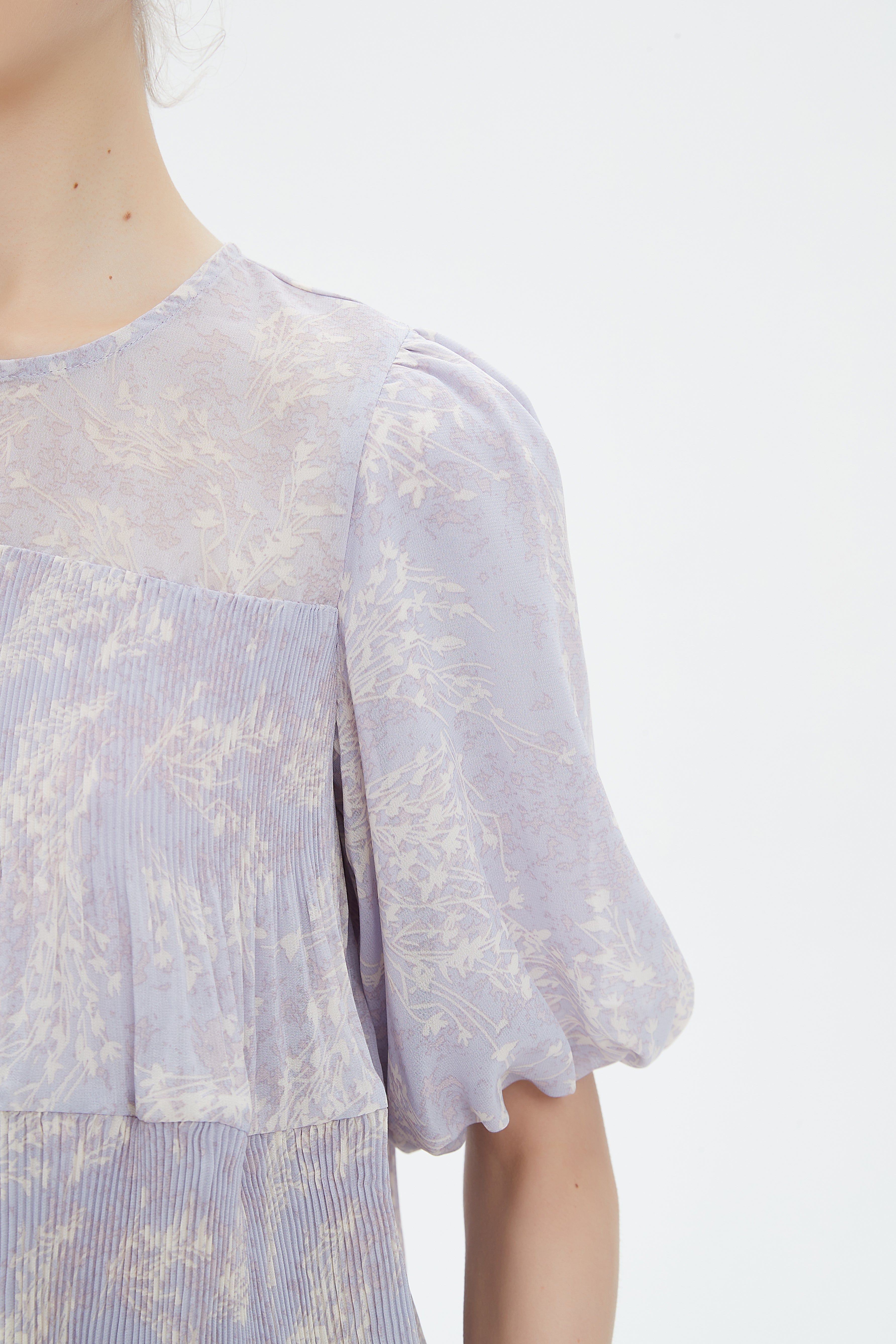 نتشي توب شفاف مشجر نص كم بف نسائي