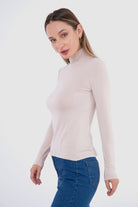 كارينا بلوزه ضيقة طويلة الأكمام بياقة عالية