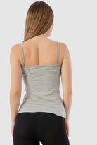 كارينا توب ضيق حريمي سادة بحمالات رفيعة