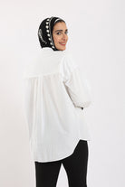 كارينا قميص سادة بأزرار أمامية بجيب مطبوع كم طويل