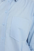 كارينا قميص سادة بأزرار أمامية واسع كم طويل نسائي