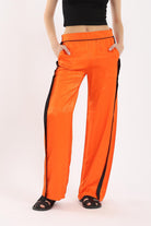 كارينا بنطال وايد ليج باللون البرتقالي طوي سادة برتقالي