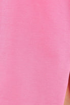 كارينا فستان ميدي سادة أوفر سايز بفتحة من أسفل نص كم